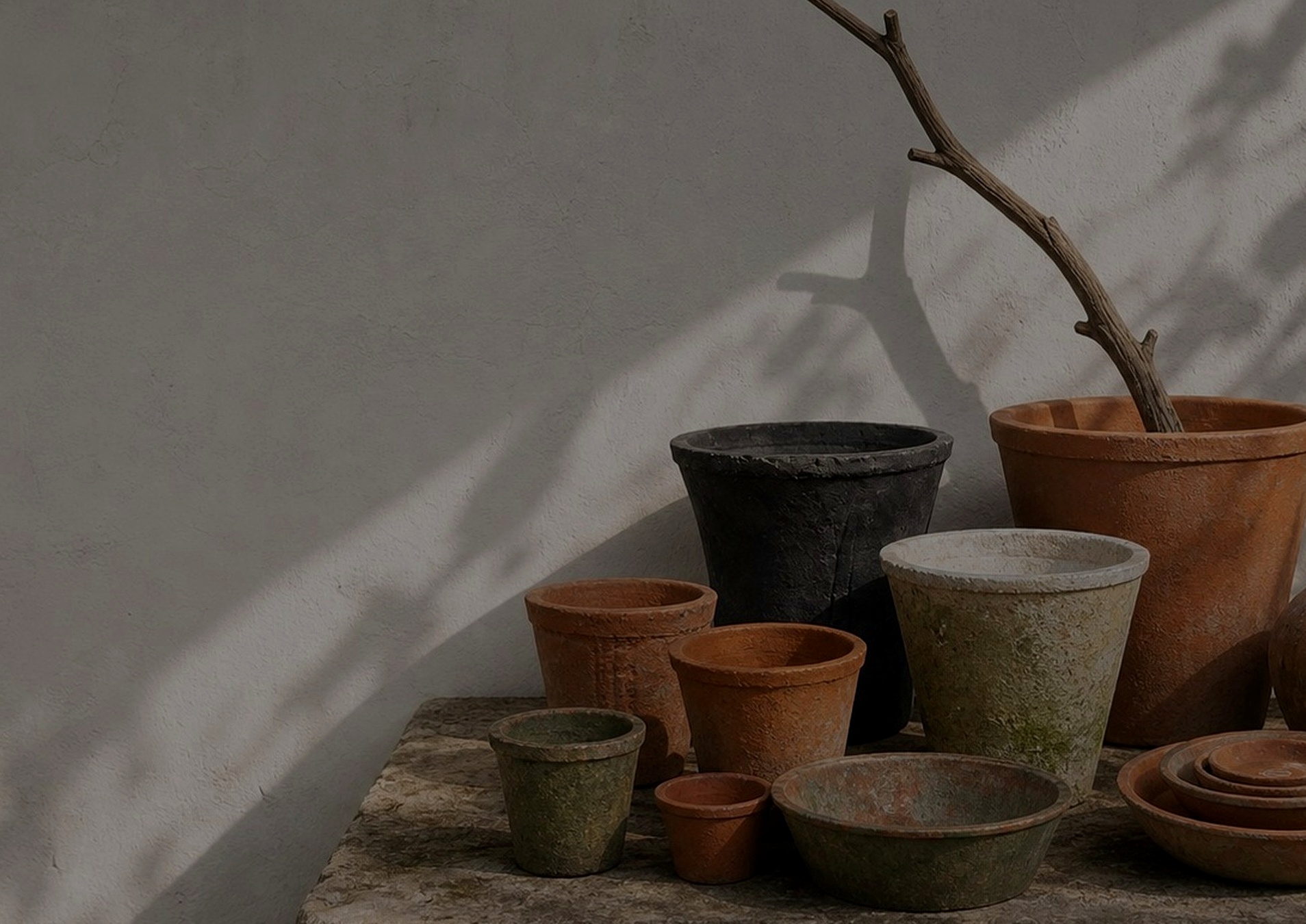 TAO-POTS collection of terracotta pots in rustic finishes